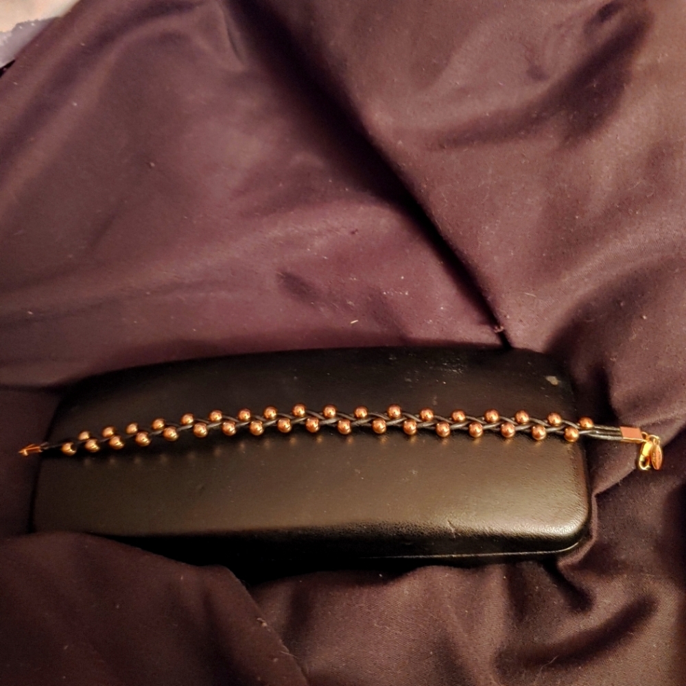 Black leather and gold bead bracelet